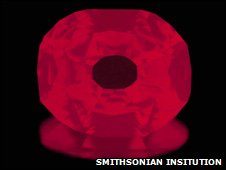 Under ultraviolet light, the diamond has an orange hue